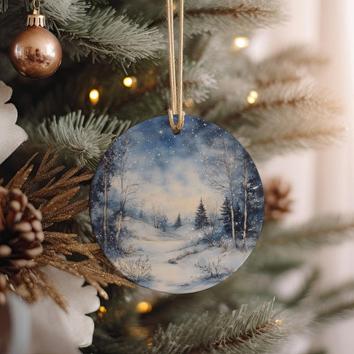 a christmas ornament hanging from a christmas tree