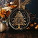 a black and gold plate with a christmas tree on it
