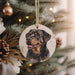 a christmas ornament with a picture of a dog on it
