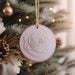 a close up of a christmas tree with ornaments