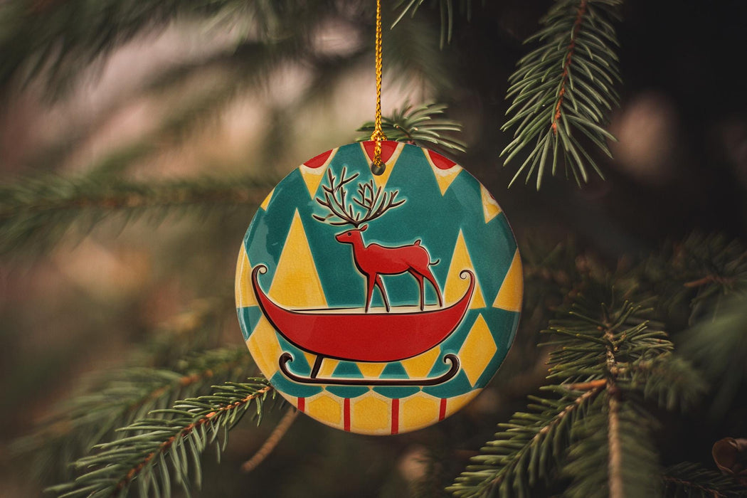 a christmas ornament hanging from a tree