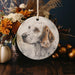 a ceramic ornament with a picture of a dog on it