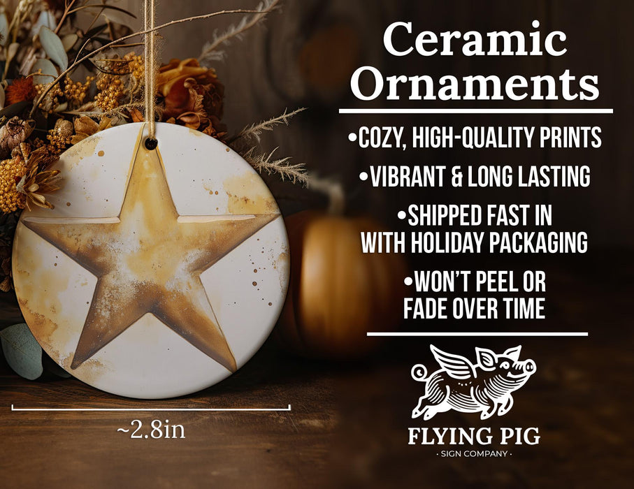 a ceramic star ornament hanging from a string