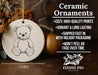 a ceramic ornament with a drawing of a teddy bear