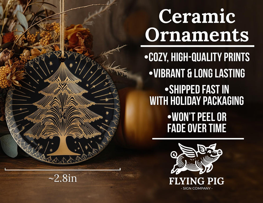 a black and gold plate with a christmas tree on it