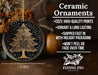 a black and gold plate with a christmas tree on it