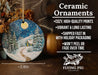 a ceramic christmas ornament with a snowy scene