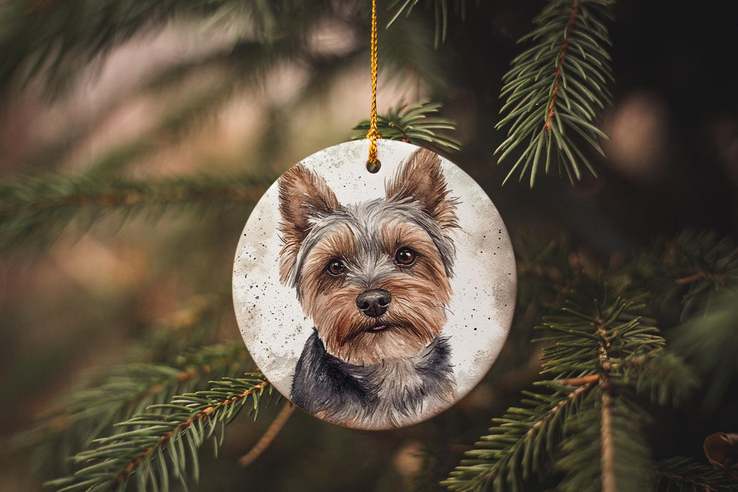 a dog ornament hanging from a christmas tree