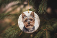 a dog ornament hanging from a christmas tree
