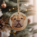 a wooden ornament with a picture of a dog on it