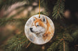 a christmas ornament with a picture of a dog on it