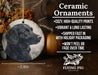 a ceramic ornament with a black dog on it