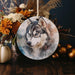 a ceramic ornament with a picture of a wolf on it