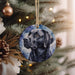 a christmas ornament hanging from a christmas tree