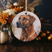 a picture of a dog is hanging on a wall