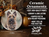 a ceramic ornament with a picture of a dog