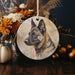 a picture of a german shepherd on a ceramic ornament
