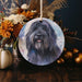 a ceramic ornament with a picture of a dog