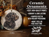 a ceramic ornament with a black dog on it