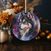 a picture of a wolf is hanging from a string