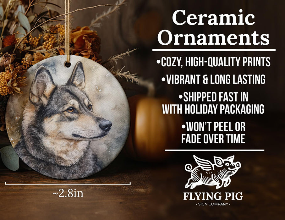 a ceramic ornament with a wolf on it