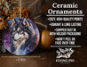 a ceramic ornament with a wolf on it