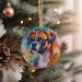 a dog ornament hanging from a christmas tree