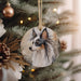 a dog ornament hanging from a christmas tree
