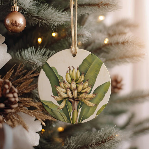 a ceramic ornament hanging from a christmas tree