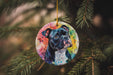 a dog ornament hanging from a christmas tree