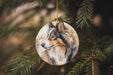 a christmas ornament with a picture of a dog on it