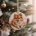 a small dog ornament hanging from a christmas tree
