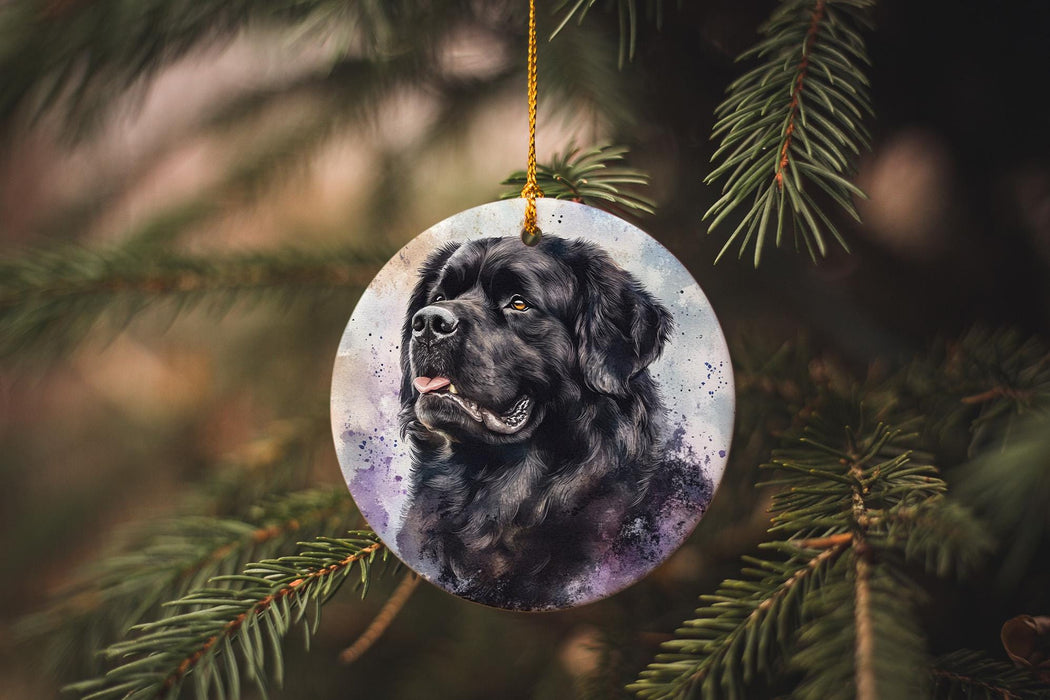 a black dog ornament hanging from a christmas tree