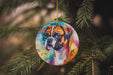 a dog ornament hanging from a christmas tree