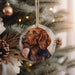 a dog ornament hanging from a christmas tree
