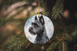 a christmas ornament with a picture of a dog on it