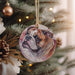 a dog ornament hanging from a christmas tree