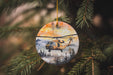 a christmas ornament hanging from a tree