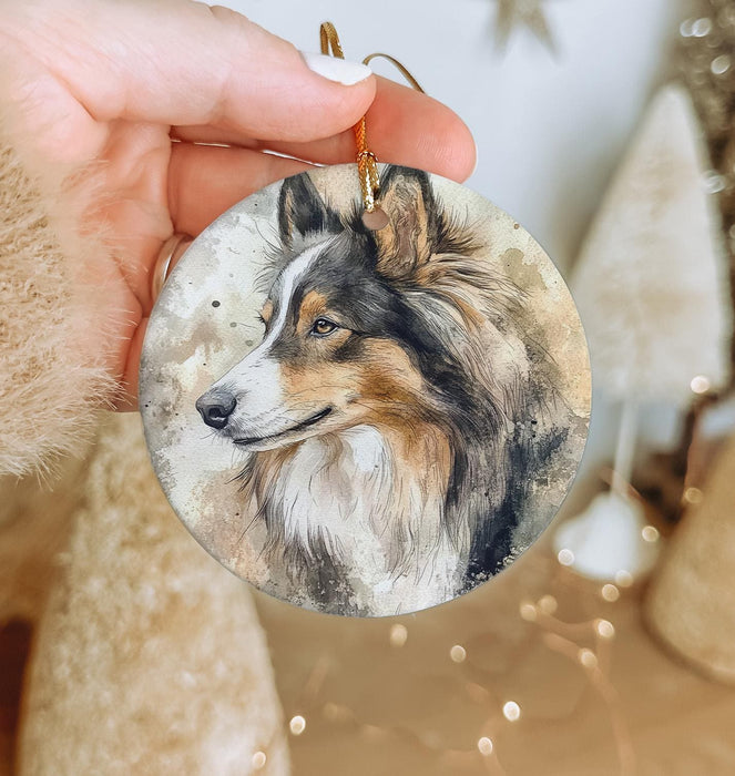 a person holding a dog ornament in their hand
