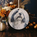 a ceramic ornament with a picture of a dog on it