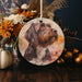 a ceramic ornament with a picture of a dog on it