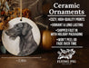 a ceramic ornament with a black dog on it