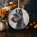 a christmas ornament with a picture of a dog