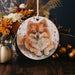 a ceramic ornament with a picture of a dog on it