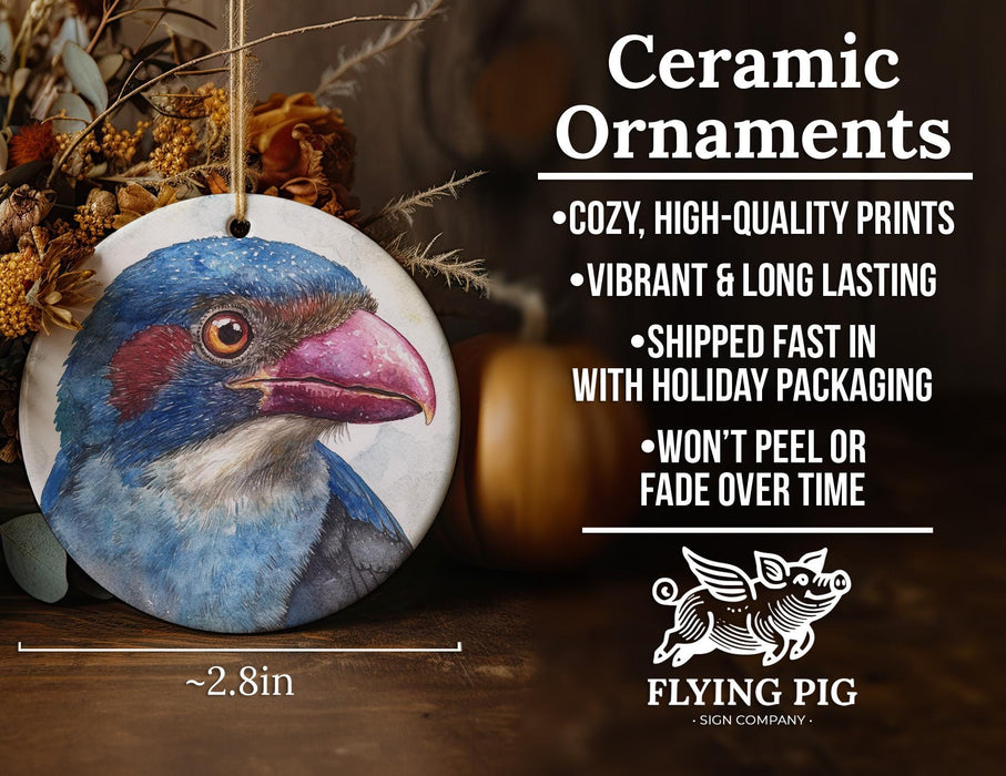 a ceramic ornament with a blue bird on it