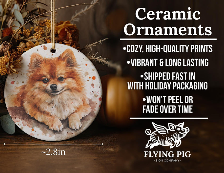 a ceramic ornament with a pomeranian dog on it