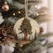 a christmas ornament hanging from a christmas tree