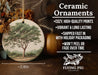 a ceramic ornament with a picture of a tree on it