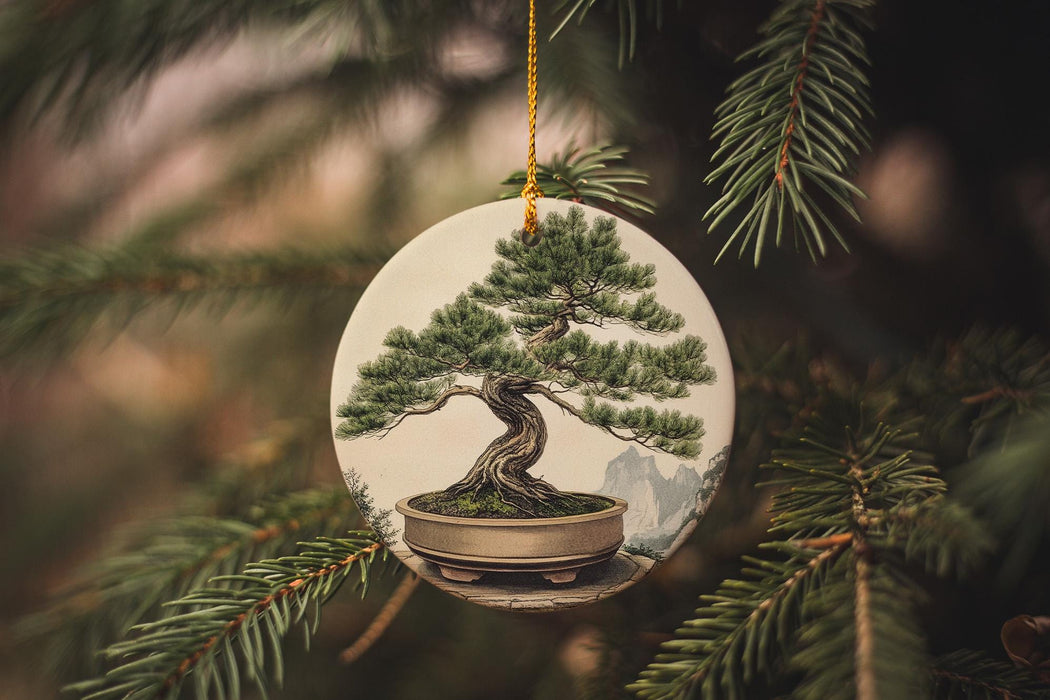 a ceramic ornament with a bonsai tree on it