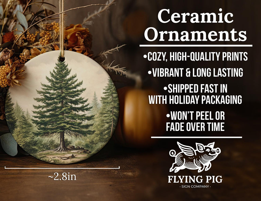 a ceramic ornament with a picture of a pine tree
